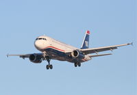 N633AW @ KORD - US Airways A320-231, AWE320, arriving RWY 28 KORD from KLAS. - by Mark Kalfas