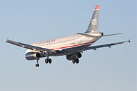 N633AW @ KORD - US Airways A320-231, AWE320, arriving RWY 28 KORD from KLAS. - by Mark Kalfas