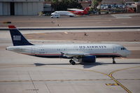 N647AW @ PHX - N647AW taxiing down Charlie - by AJ Heiser