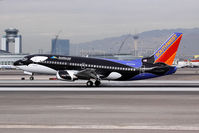 N334SW @ LAS - Southwest Airlines Shamu N334SW (FLT SWA5685) from San Diego Int'l (KSAN) landing RWY 25L. - by Dean Heald