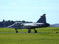 9240 @ EGQL - JAS-39C Gripen from 211tl,taxiing to the runway for it's display at Leuchars airshow '09 - by Mike stanners
