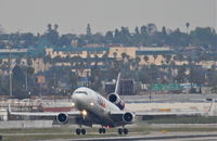 N598FE @ KLAX - FedEX MD-11F arriving 25L KLAX. - by Mark Kalfas