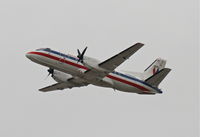 N388AE @ KLAX - American Eagle SAAB 340B, 25R departure KLAX. - by Mark Kalfas