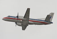 N388AE @ KLAX - american Eagle SAAB 340B, 25R departure KLAX. - by Mark Kalfas