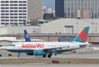 N803AW @ KLAX - America West  A319-132, arriving 25L KLAX. - by Mark Kalfas