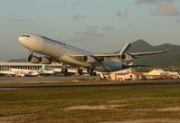 F-GLZL @ TNCM - Air france departing TNCM runway 28 into the sunset - by Daniel Jef