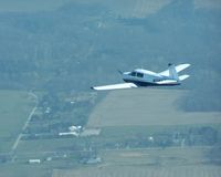 N1145T @ KDLZ - N1145T in flight over Ohio - by Jim Elswick