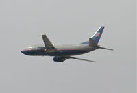 N372UA @ KLAX - United Airlines Boeing 737-322, N372UA departing KLAX 25R on the LOOP FOUR to KORD - by Mark Kalfas