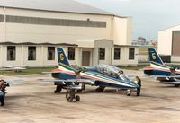 MM55052 @ EGVA - MB339A number 6 of the Italian Air Force's Frecce Tricolori display team on the flight-line at the 1987 Intnl Air Tattoo at RAF Fairford. - by Peter Nicholson