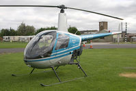 G-BSGF @ EGBR - Robinson R-22 Beta at Breighton Airfield in 2009. - by Malcolm Clarke