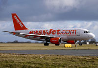 G-EZAO @ EGGW - Easyjet A319 taxies out at Luton - by Terry Fletcher