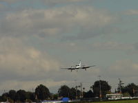 N414HB @ POC - Returning home and on final to runway 26L - by Helicopterfriend