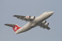 HB-IXW @ EBBR - Flight LX779 is taking off from RWY 07R - by Daniel Vanderauwera