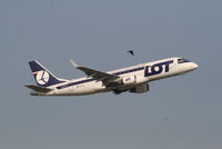 SP-LIC @ EBBR - Flight LO236 is taking off from RWY 07R - racing with a bird ... - by Daniel Vanderauwera