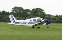 G-BNTD @ EGTC - Piper PA-28-161 Cherokee Warrior II at Cranfield Airport in 2004. - by Malcolm Clarke