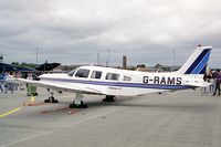 G-RAMS @ EGXW - Piper PA-32R-301 Saratoga SP at RAF Waddington in 1995. - by Malcolm Clarke