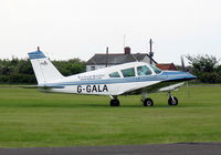 G-GALA @ EGTC - Piper PA-28-180 Cherokee E at Cranfield Airport in 2004. - by Malcolm Clarke