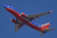 N273WN @ SNA - Southwest B737 with Adopt A Pilot Nose blasting off on a gorgeous day! - by Mike Khansa
