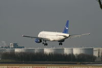 YK-AKF @ EBBR - Several seconds before landing on RWY 25L - by Daniel Vanderauwera