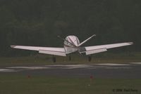 N7797R @ PVG - Touching down on RWY 2 - by Paul Perry