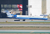 N785SK @ KLAX - SkyWest Bombardier CL-600-2C10,  N785SK taxiway Bravo KLAX. - by Mark Kalfas