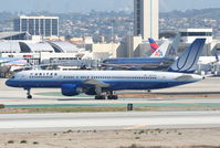 N527UA @ KLAX - United Airlines Boeing 757-222, N527UA taxiway Papa KLAX. - by Mark Kalfas