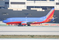 N314SW @ KLAX - Southwest Airlines Boeing 737-3H4, N314SW taxiway Quebec KLAX. - by Mark Kalfas