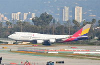 HL7421 @ KLAX - Asiana Boeing 747-48E, HL7421 touching down 24RR KLAX. - by Mark Kalfas