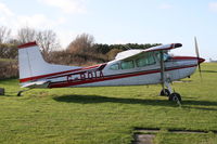 G-BOIA @ EGTR - Cessna 180K c/n 53121 - by Trevor Toone