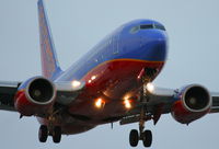 N430WN @ KLAX - Southwest Airlines Boeing 737-7H4, SWA242 from KPHX, 24R approach KLAX. - by Mark Kalfas