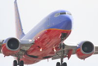 N787SA @ KLAX - Southwest Airlines Boeing 737-7H4, SWA2272 from KOAK, 24R approach KLAX. - by Mark Kalfas