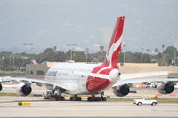 VH-OQA @ KLAX - Qantas Airbus A380-842, VH-OQA, getting a tug to maintenance via taxiway Quebec after arriving from YSSY as QFA11. - by Mark Kalfas