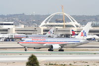 N319AA @ KLAX - American Airlines Boeing 767-223. N319AA, AAL1 arriving from JFK, taxiway Hotel. - by Mark Kalfas
