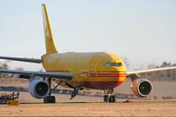 OO-DIF @ EGBP - European Air Transport, It wears the reg no. EI-OZA on the port side - by Chris Hall