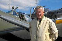 G-ASJV @ EGKB - Ray Hanna at the 2004 Biggin Hill Press Day in front of his Supermarine Spitfire Mk IX MH434 - by Sean Mulcahy