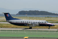 N235SW @ SFO - Another Embraer wearing old colors - by Duncan Kirk