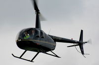 G-CFNF @ EGBK - Sloane Helicopters Ltd Robinson R44 Raven II - by Chris Hall