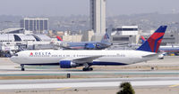 N135DL @ KLAX - Taxi at LAX - by Todd Royer