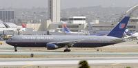 N673UA @ KLAX - Taxi at LAX - by Todd Royer