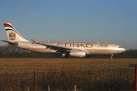 A6-EYR @ EGCC - Etihad Airways - by Chris Hall