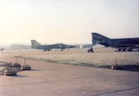 70-2373 - F-111F. 70-2373  Taxiing by F-4D's at RAF Lakenheath, 1977 - by Onmark57