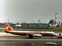 XA-SID @ JFK - Aeromexico DC-8-51 taxying at Kennedy in the Summer of 1977. - by Peter Nicholson
