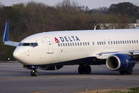 N3737C @ ORF - Delta AirLines N3737C (FLT DAL1238) exitting RWY 5 after arrival from Hartsfield-Jackson Atlanta Int'l (KATL). If you look closely, you can see the HUD in front of the pilot. - by Dean Heald