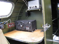 N5017N @ OXR - 1944 Boeing B-17G Flying Fortress 'Aluminum Overcast' , radio operator compartment (roomiest in the plane?) vintage transceiver & work desk. Note: Morse code key. - by Doug Robertson