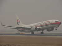 B-5086 @ ZBAA - Wheels just leaving chinese ground. - by ghans