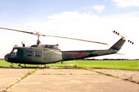 G-HUEY @ EGTC - Bell UH-1H Iroquois (205) at Cranfield Airport in 1995. - by Malcolm Clarke