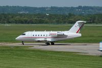 N604CE @ KLUK - Arriving as Reynolds Jet 4108. Citation XLS N145PK on final in the background. - by Lord Gale