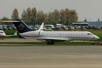 A6-FBQ @ EGGW - Global Express being parked  at Luton - by Terry Fletcher