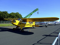 G-BSBT @ EGQL - Piper cub in the static display at Leuchars airshow 2009 - by Mike stanners