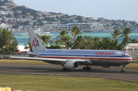 N371AA @ TNCM - American airlines 767-323 back tracking the active for take off - by Daniel Jef